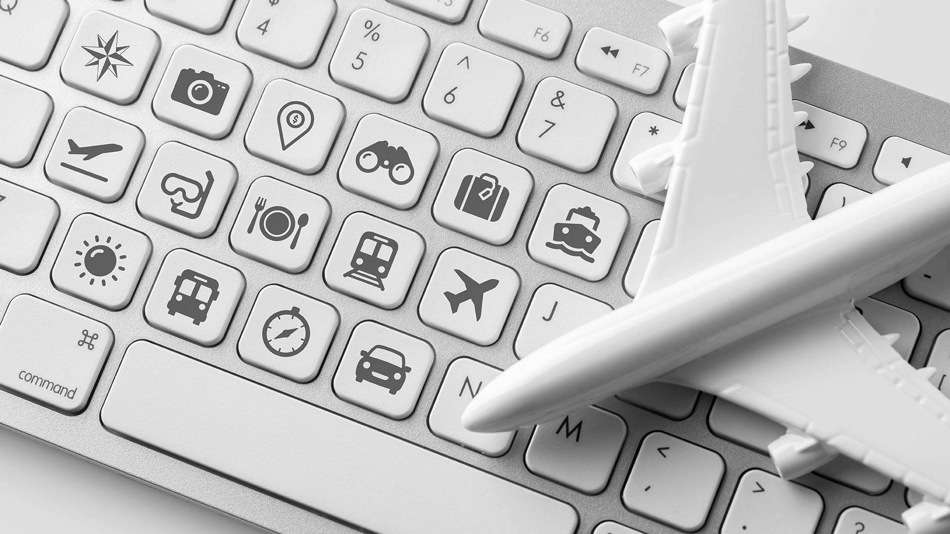 Travel image with keyboard and airplane